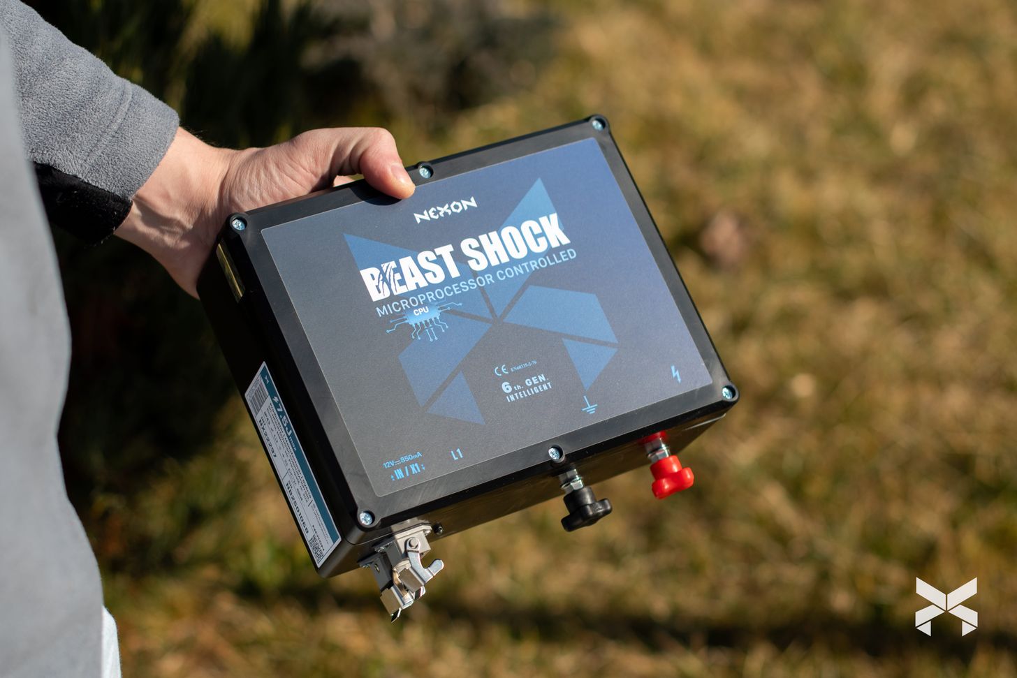 Close-up of BeastShock smart electric fence device used in the Nexon scrapping program